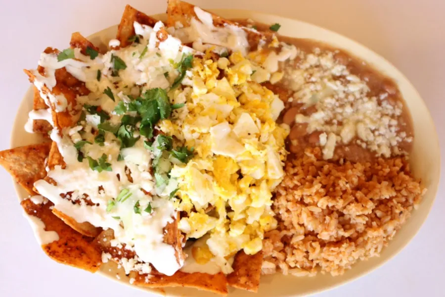 Pico Pica Rico | Chilaquiles Rojo/Verde - Fried Tortilla Chips, Eggs, Rice & Beans - Choice of Rojo or Verde Sauce