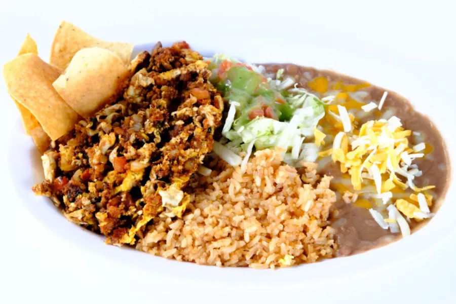 Pico Pica Rico | Machaca - Slow cooked Dried and Shredded Meat: Beef or Pork. Tortilla Chips, Onions and Peppers. Rice & Beans