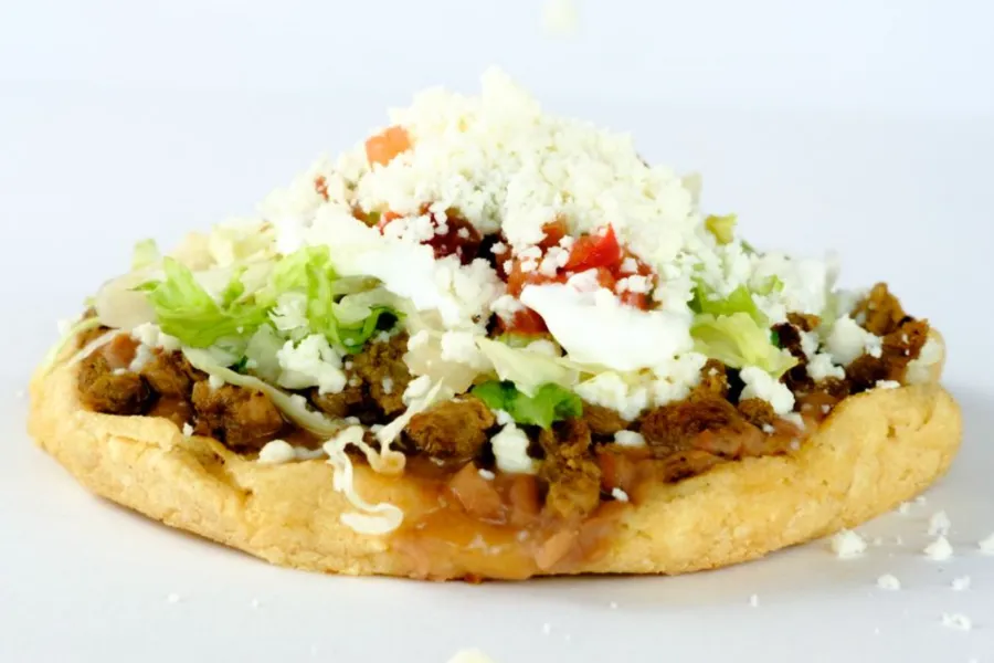 Pico Pica Rico | Sope - Handmade tortilla with beans, lettuce, tomato, onions, cilantro | Sherman Oaks